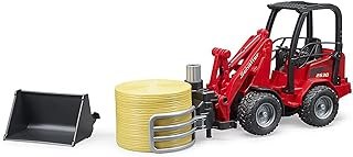Schaffer Hoflader 2630 con forca per balle e 1 bal Bruder 02192